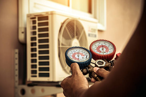 Professional Hvac technician working in Pikeville, NC